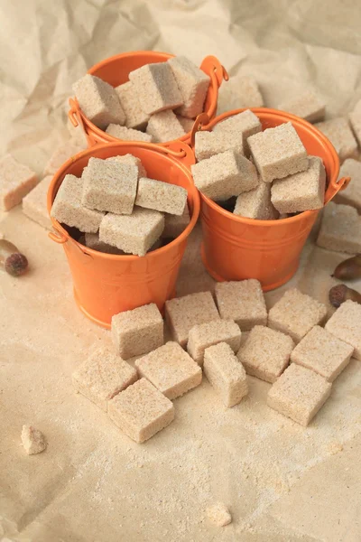 Heap sugar cubes on natural — Stock Photo, Image