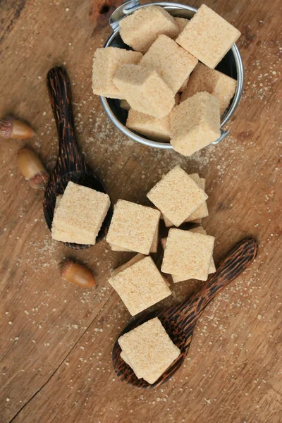 Heap sugar cubes on natural — Stock Photo, Image