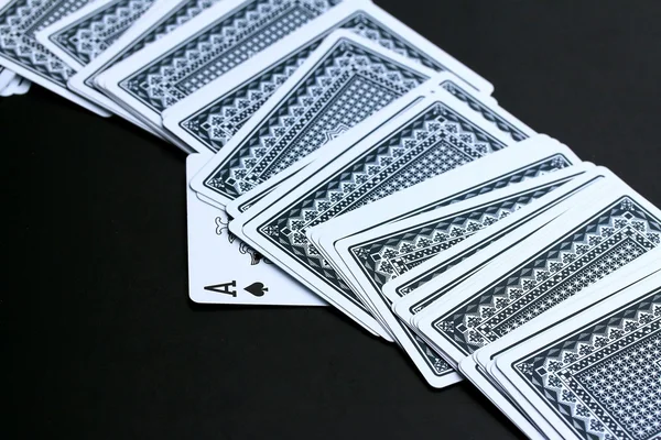 Playing cards on black background — Stock Photo, Image