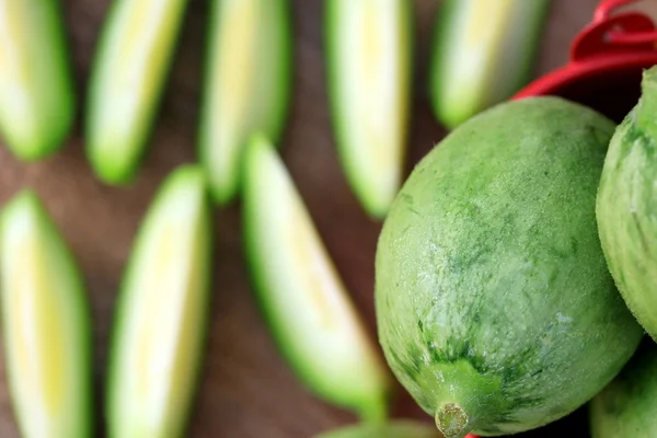 Baby melon på trä vintage — Stockfoto