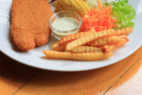 Fish steak with french fries — Stock Photo, Image