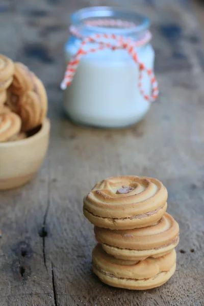 Chutný krém cookies a mléko — Stock fotografie