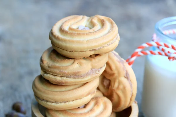 Chutný krém cookies a mléko — Stock fotografie