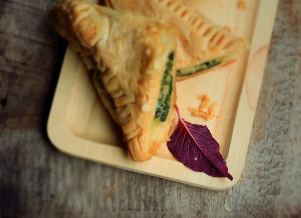 Tasty puff spinach pie — Stock Photo, Image