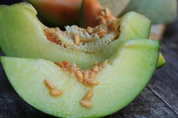 Mix van vers groen en oranje meloen — Stockfoto