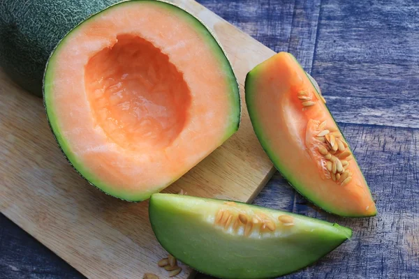 Mix van vers groen en oranje meloen — Stockfoto