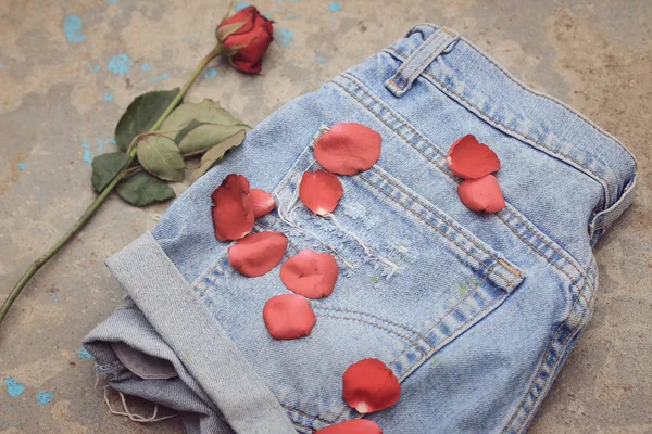 Blue torn jeans — Stock Photo, Image