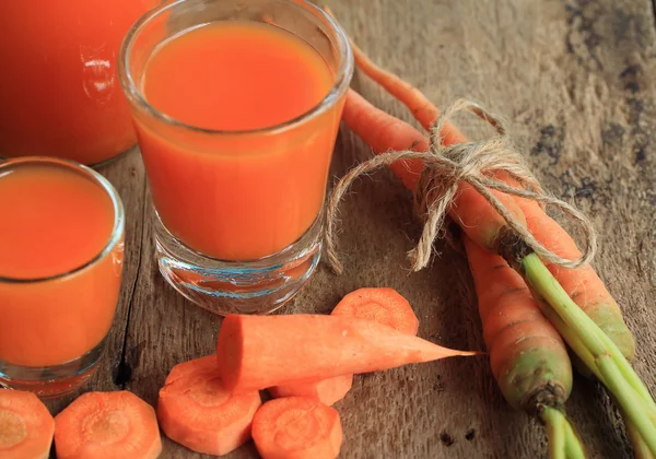 Fresh carrot with juices — Stock Photo, Image