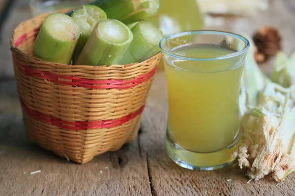 Cana-de-açúcar com melaço — Fotografia de Stock