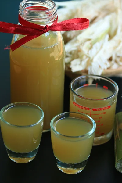 Cana-de-açúcar com melaço — Fotografia de Stock