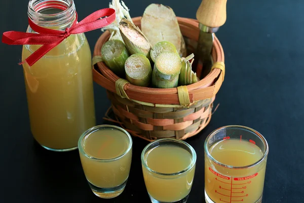 Cana-de-açúcar com melaço — Fotografia de Stock