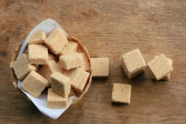 Zucchero cubi legno fondo — Foto Stock