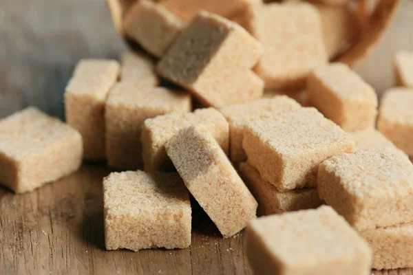 Sugar cubes wood background — Stock Photo, Image