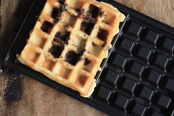 Tasty waffle with cooking — Stock Photo, Image