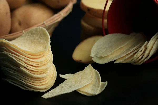 fresh potatoes with potato chips