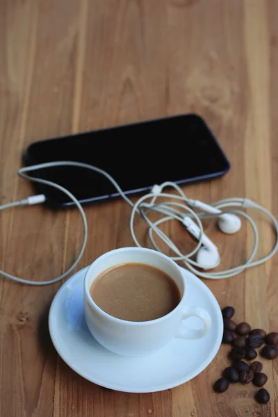 Hot coffee with smart phone — Stock Photo, Image