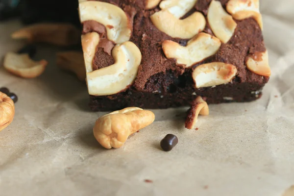 Chocolate brownie with cashew nuts — Stock Photo, Image