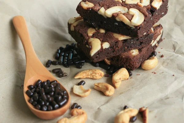 Chocolate brownie with cashew nuts — Stock Photo, Image