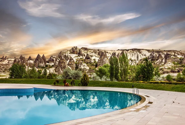Sunset landscape, swimming pool — Stock Photo, Image