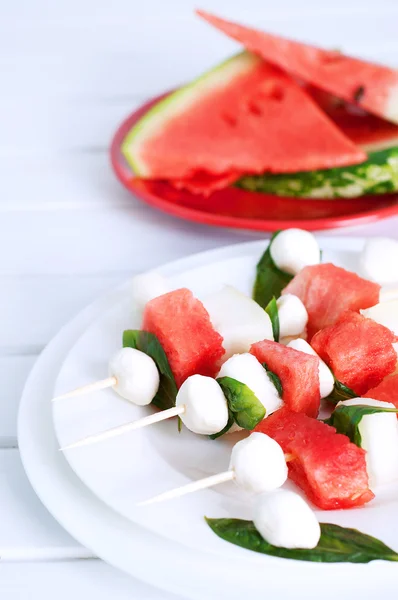Watermelon kebab with spicy sauce, basil and mozzarella cheese — Stock Photo, Image