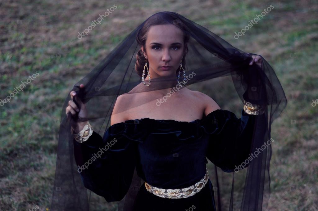 Young widow wearing black veil Stock Photo by ©different_nata 54542889