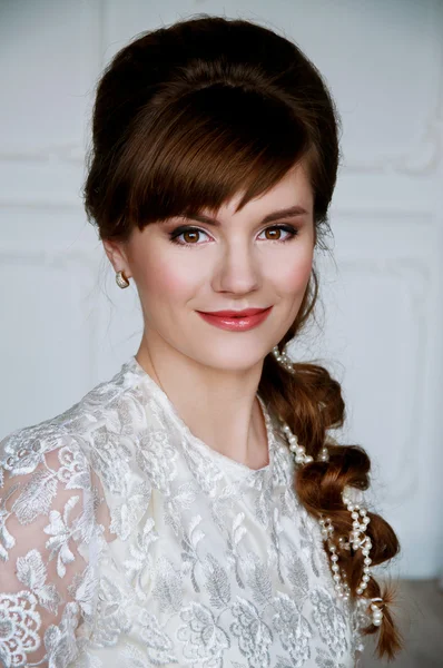 Beautiful young bride with retro hairstyle — Stock Photo, Image