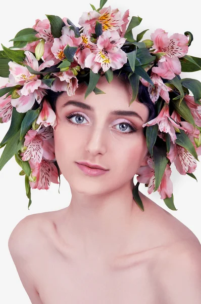 Young woman wearing pink flowers on her head — Stock Photo, Image