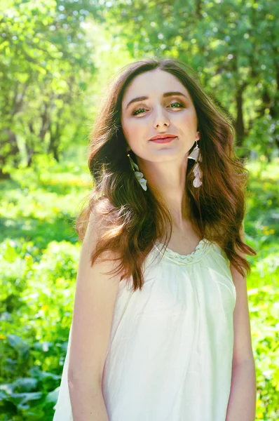 Woman in a long white dress — Stock Photo, Image