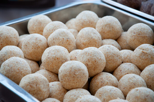 Vegetarian desserts. Powder milk balls with sesame seeds. 