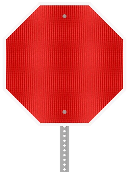 Red reflective hexagon stop sign isolated on a white background.