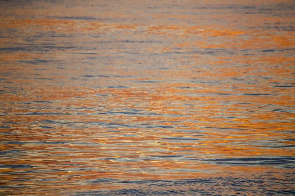 Nærbillede Til Baggrundsmateriale Havoverfladen Der Skinner Orange Lyset Den Nedgående - Stock-foto