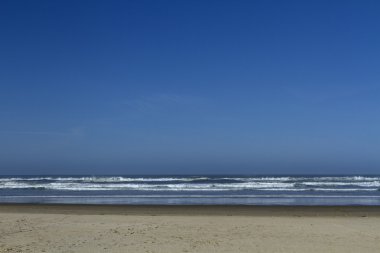 Beach günbatımı Oregon kıyılarında
