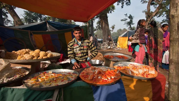 Pastry and sweet street seller in nepali fair — Stock Photo, Image