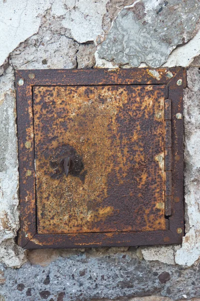 Rusty metal door panel in Rome — Stock Photo, Image