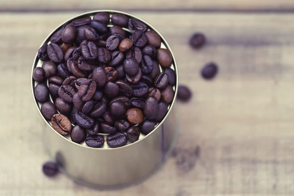 Coffee beans in a tin can — Stock Photo, Image