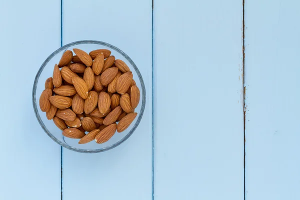 Bowl with almonds — Stock Photo, Image