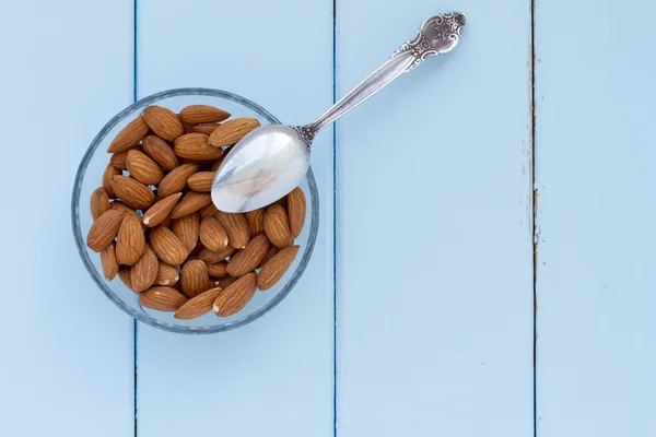Bowl with almonds — Stock Photo, Image