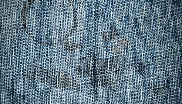 在牛仔裤的咖啡粉的痕迹 图库照片