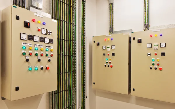 Electrical switch gear and circuit breakers that control heat, heat recovery, air conditioning, light and electrical power supply — Stock Photo, Image