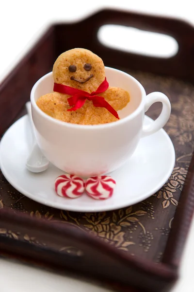 Gingerbread cookie men in a cup — Stock Photo, Image