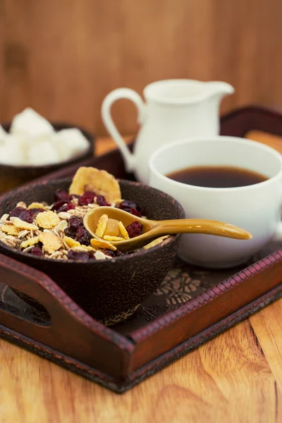 A cup of coffee, sugar, cream, muesli. Still life — Stock Photo, Image