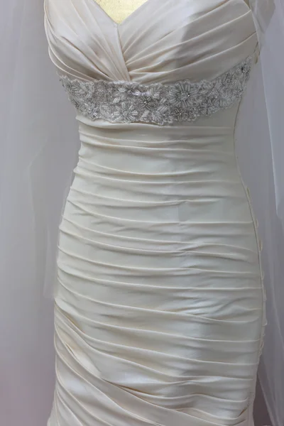 Fragment of a wedding dress. — Stock Photo, Image