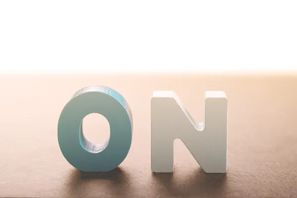 Wooden letters form the word on — Stock Photo, Image