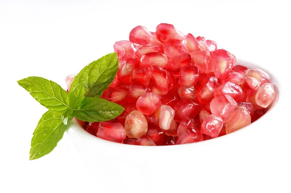 Pomegranate sedds and mint — Stock Photo, Image