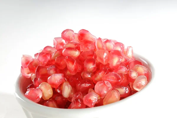 Red seeds in a bowl — Stock Photo, Image
