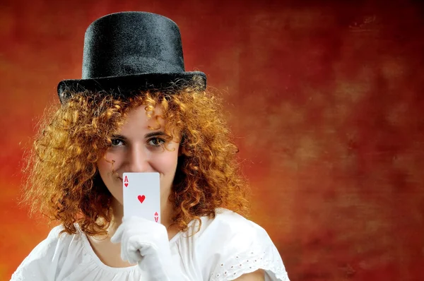 Red-haired girl with ace of hearts — Stock Photo, Image