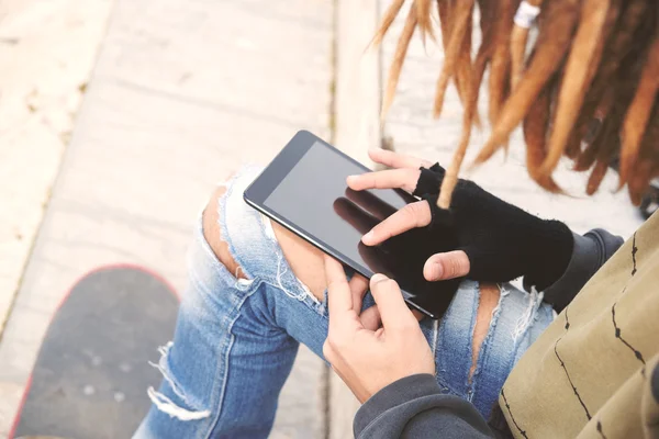 Writing on a tablet selective focus  warm tones applied — Stock Photo, Image