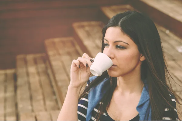 Drinking a coffee warm filter applied — Stock Photo, Image