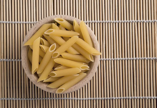 Raw pasta called penne — Stock Photo, Image