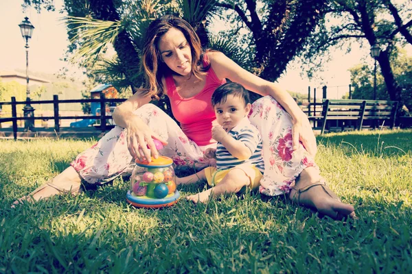 Happiness - mother with her child warm filter applied — Stock Photo, Image